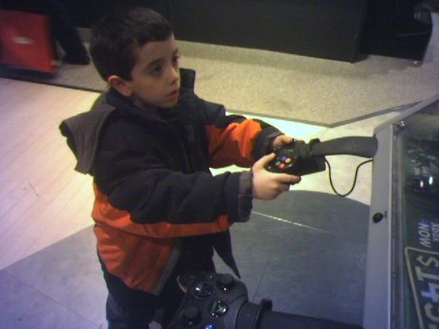 david playing game in mall
